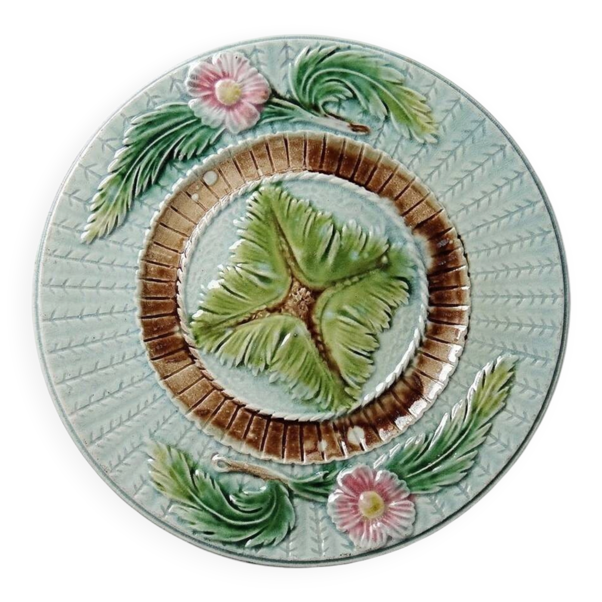 Polychrome slipware dessert plate, with a floral decoration, early 20th century.