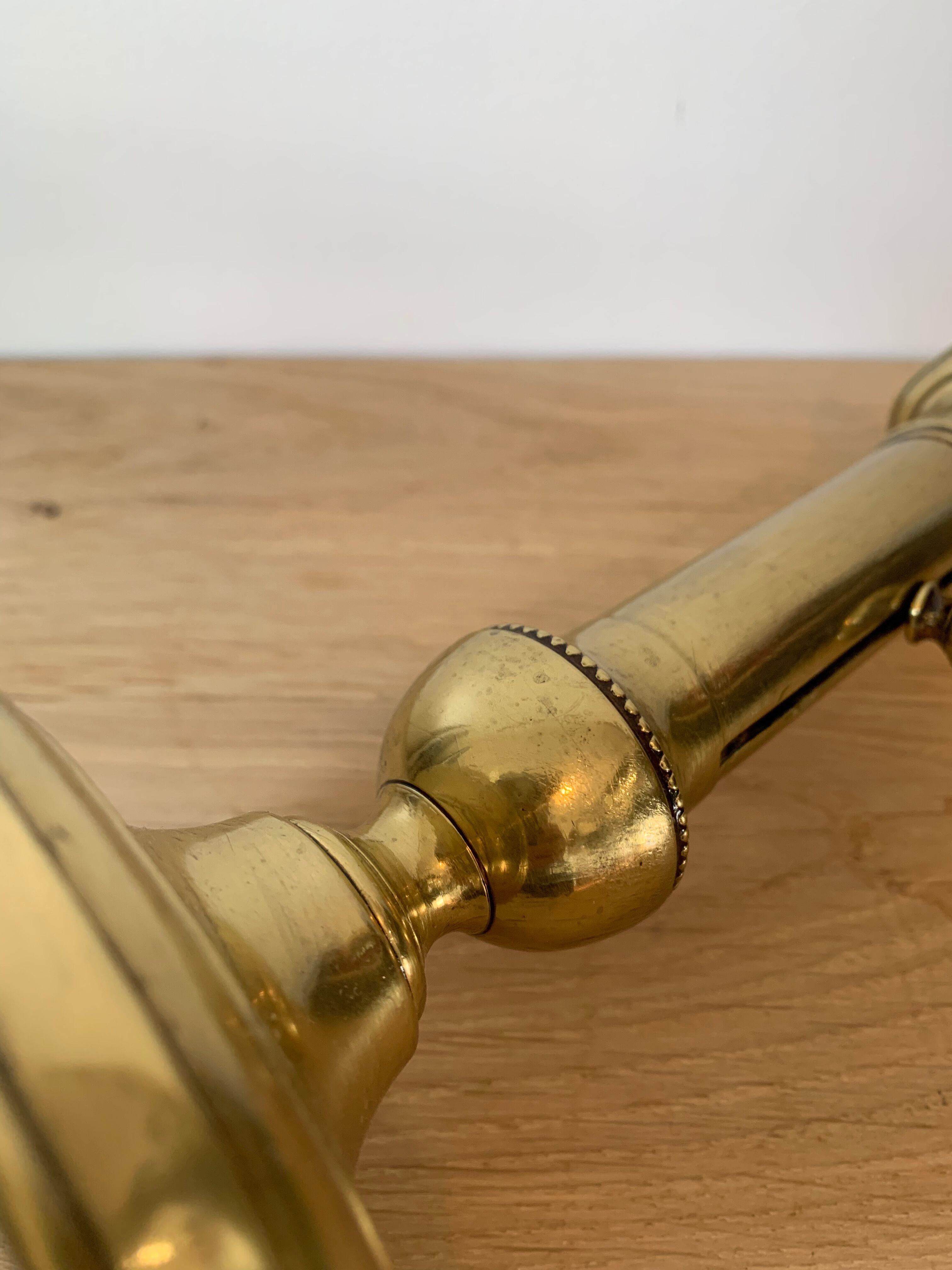 Brass pusher candle holder