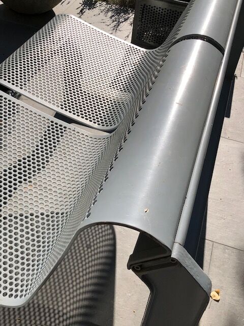 Perforated metal garden bench
