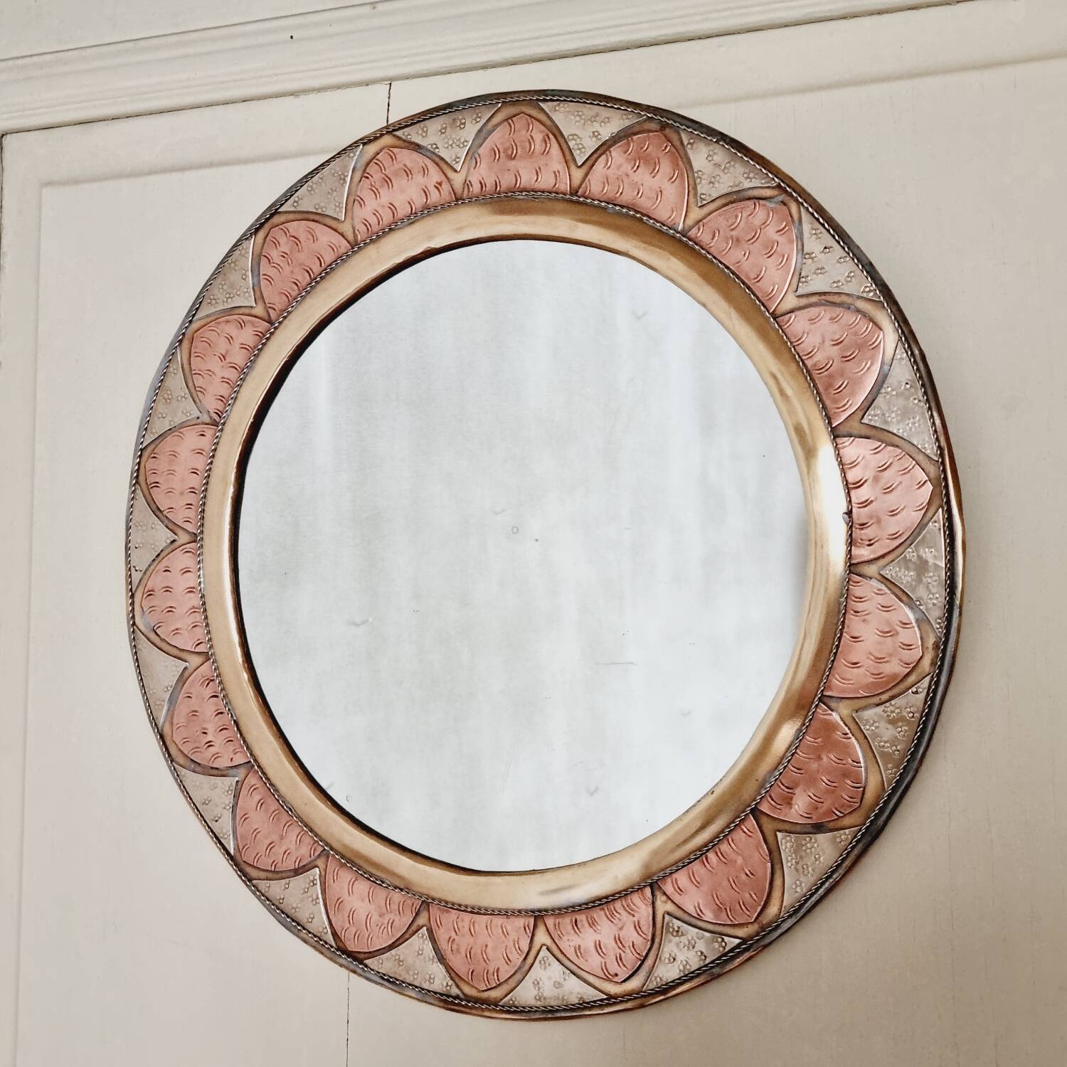 Round brass and copper mirror