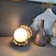 Vintage shell lamp in black porcelain with opaline globe.