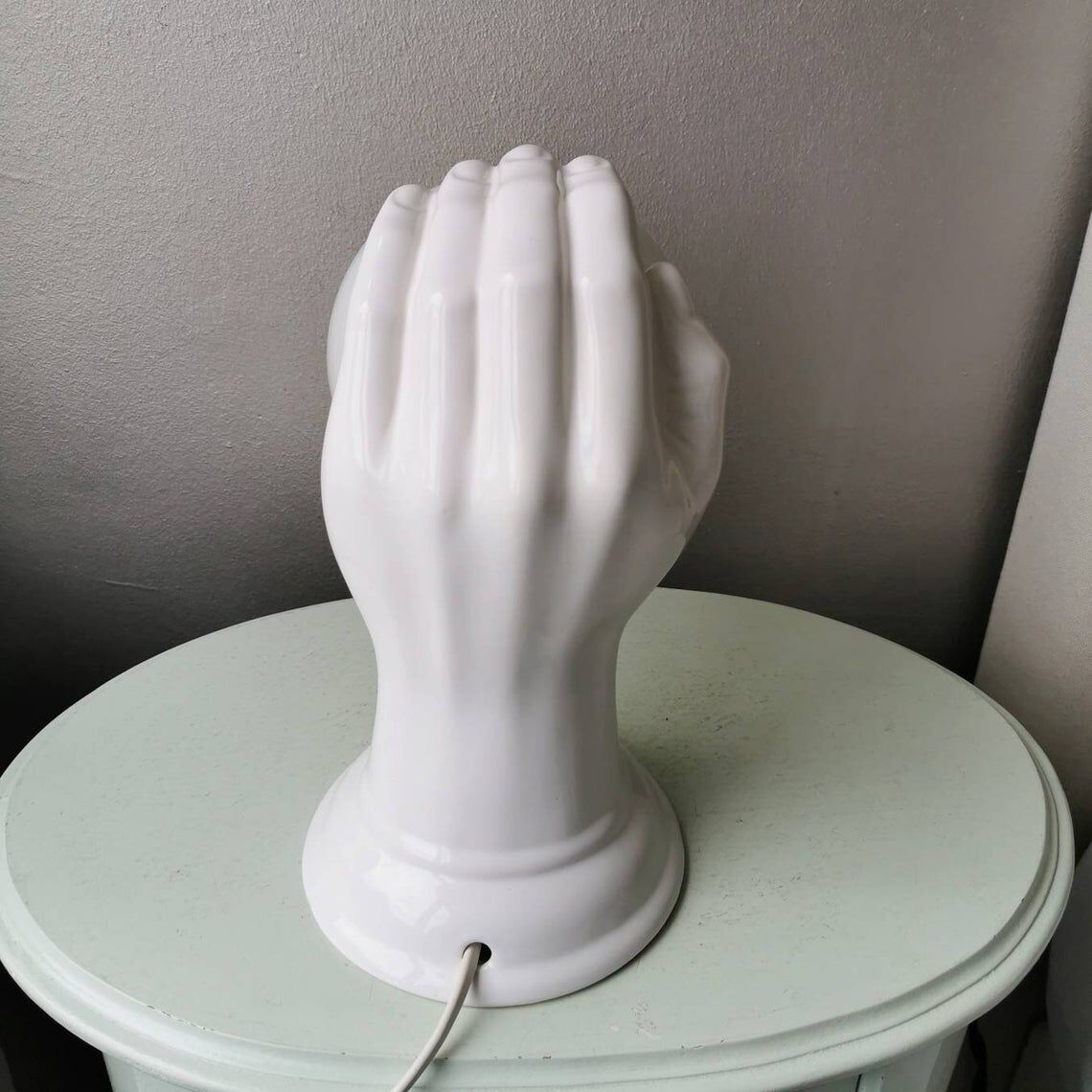 Hand-shaped ceramic wall lamp with 80s glass sphere
