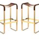 Wanderlust pair of backless stools, brown colour, with finishes.