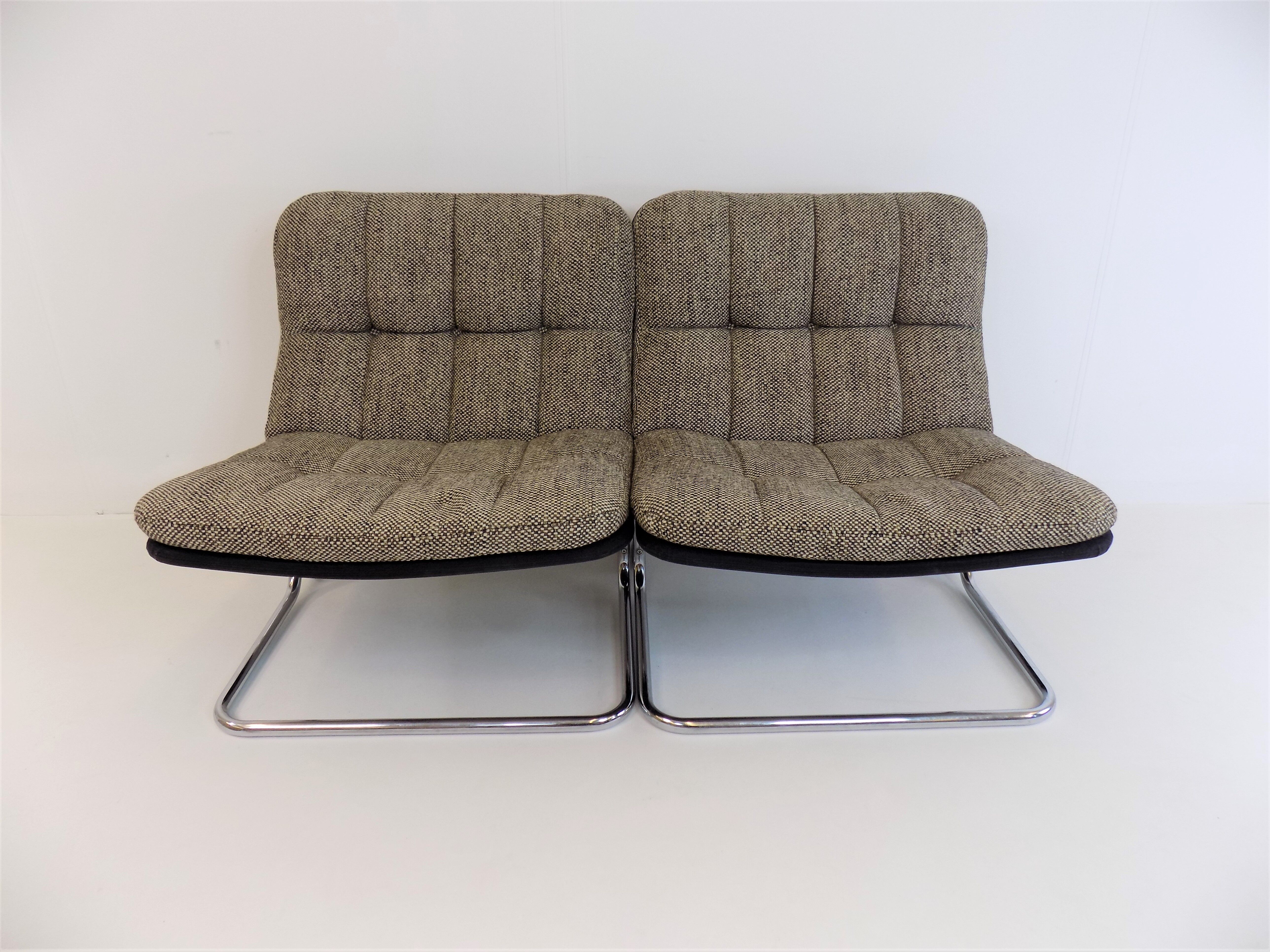 DUX International lounge chair pair