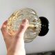 Wall lamp in gilded bubble glass