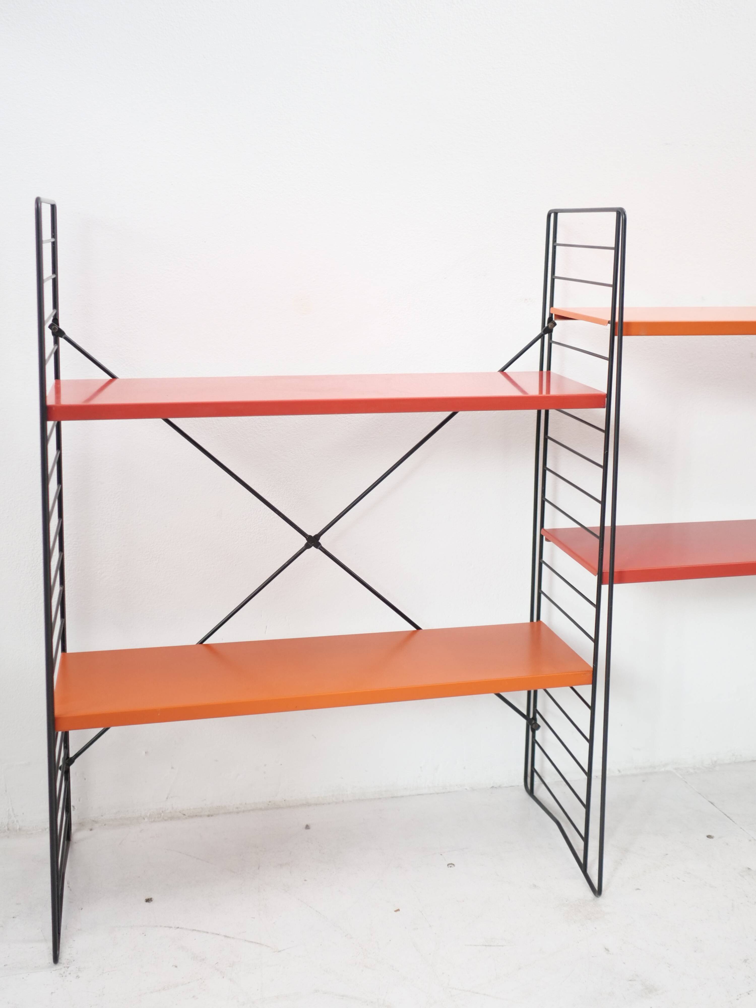 Tomado shelf in coloured metal floor shelves from 1958.