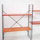 Tomado shelf in coloured metal floor shelves from 1958.