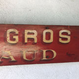 Painted wood sign