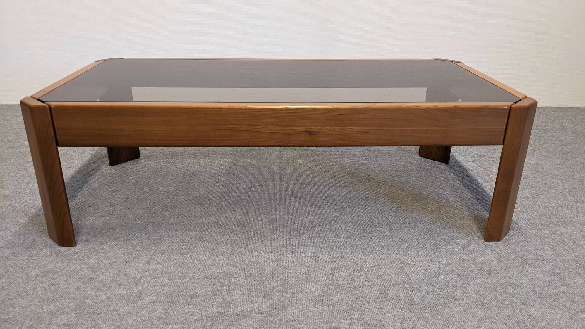 Modernist coffee table in elm and smoked glass, Italy circa 1970.