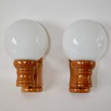 Pair of globe wall lights in pine and opaline from the 60s