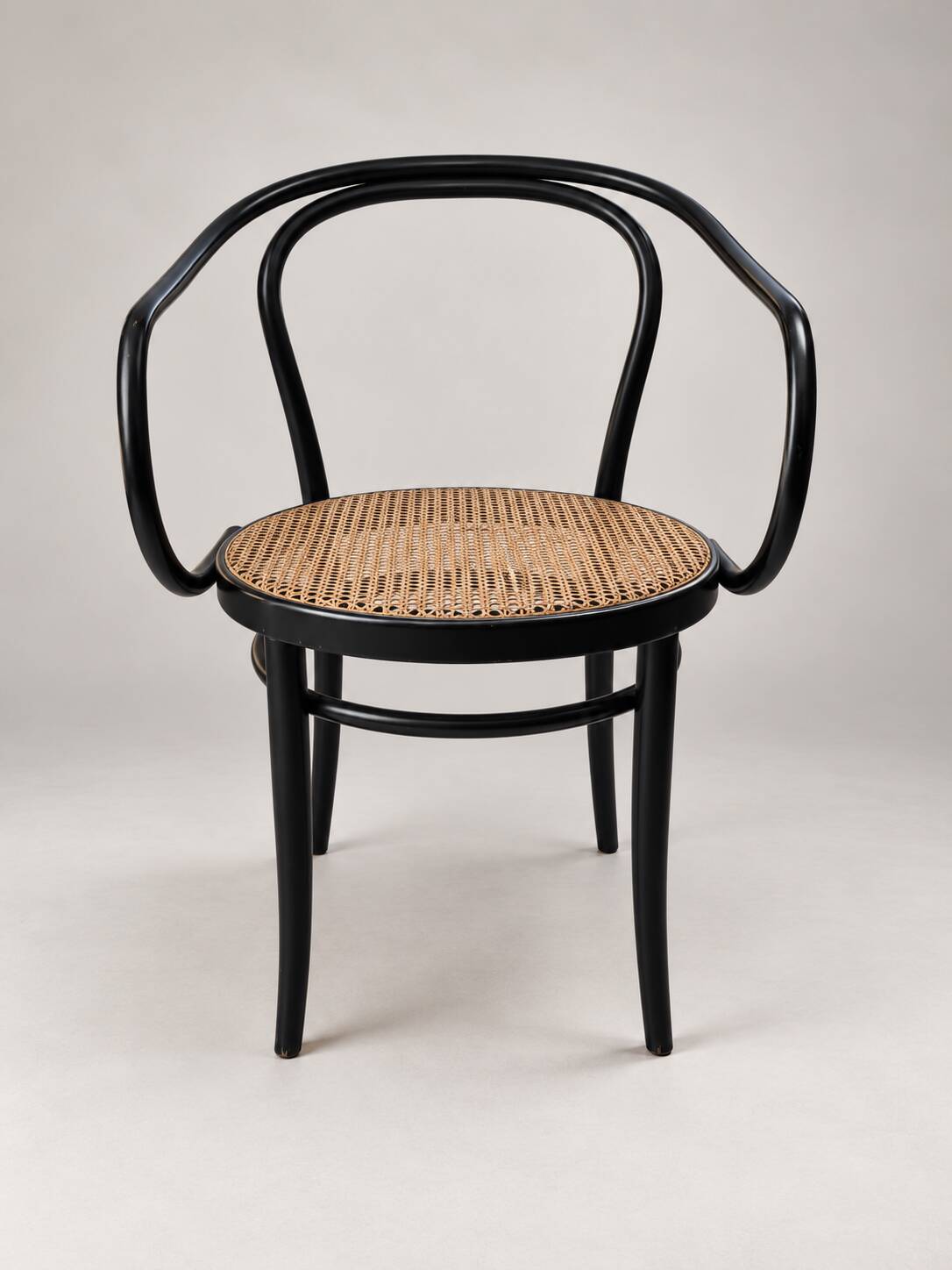 Thonet armchair in bent wood and caning – Czechoslovakia