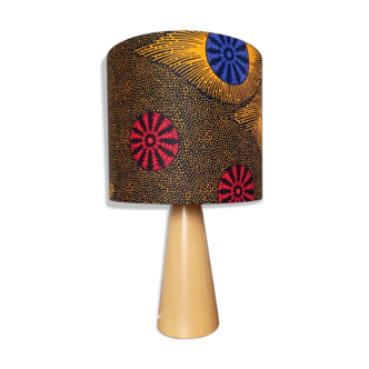 Table lamp in blond wood with handmade wax shade