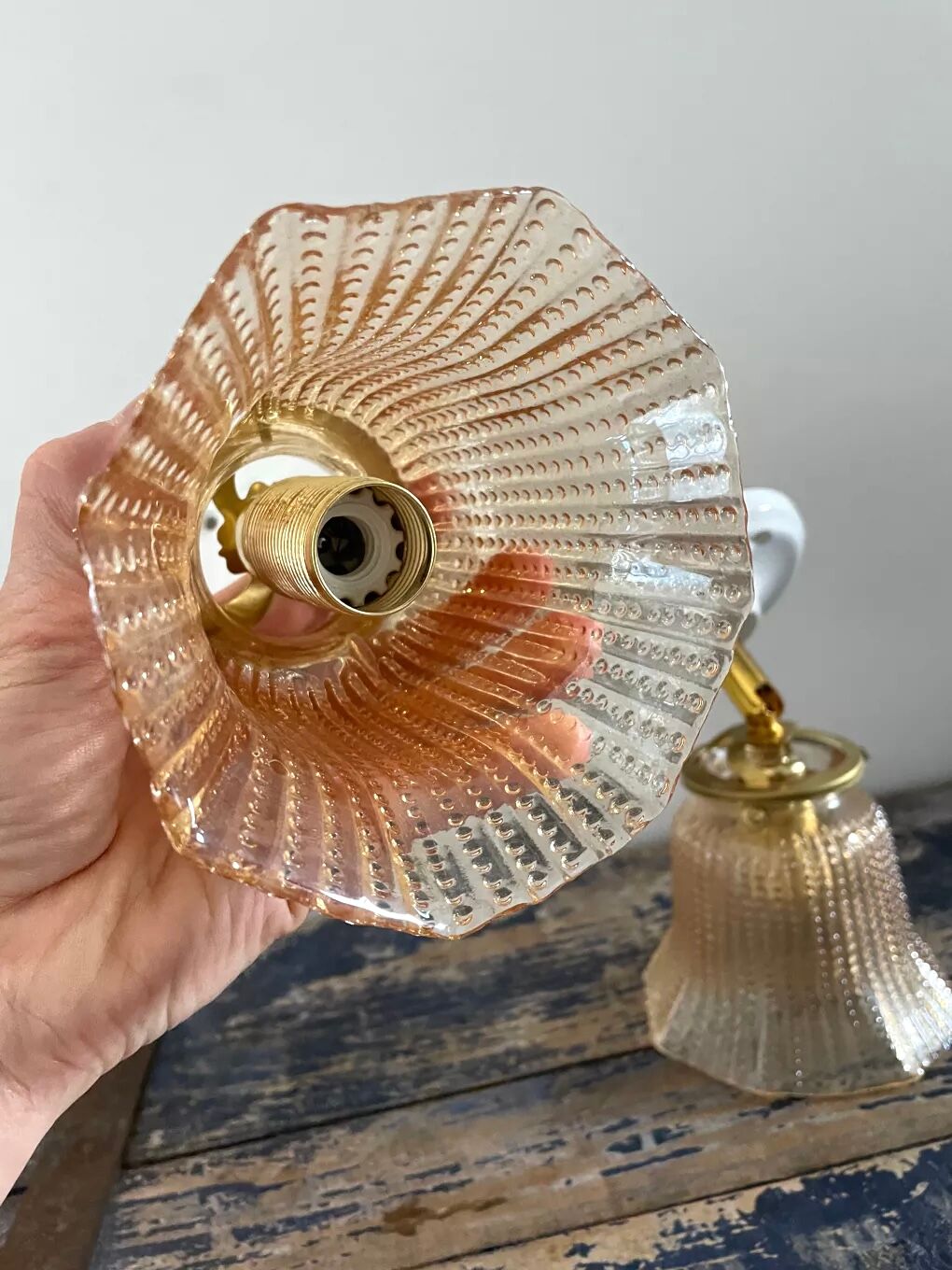 Pair of vintage sconces in electrified gold chiseled glass