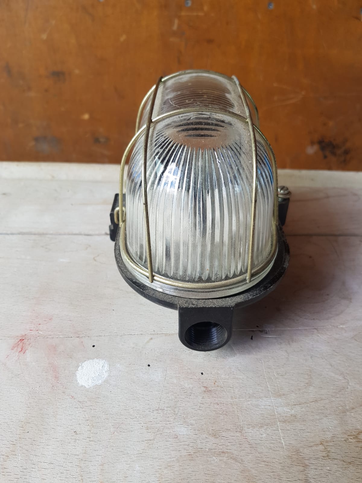 Antique exterior wall light moulded glass & metal grille & black bakelite support