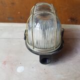 Antique exterior wall light moulded glass & metal grille & black bakelite support