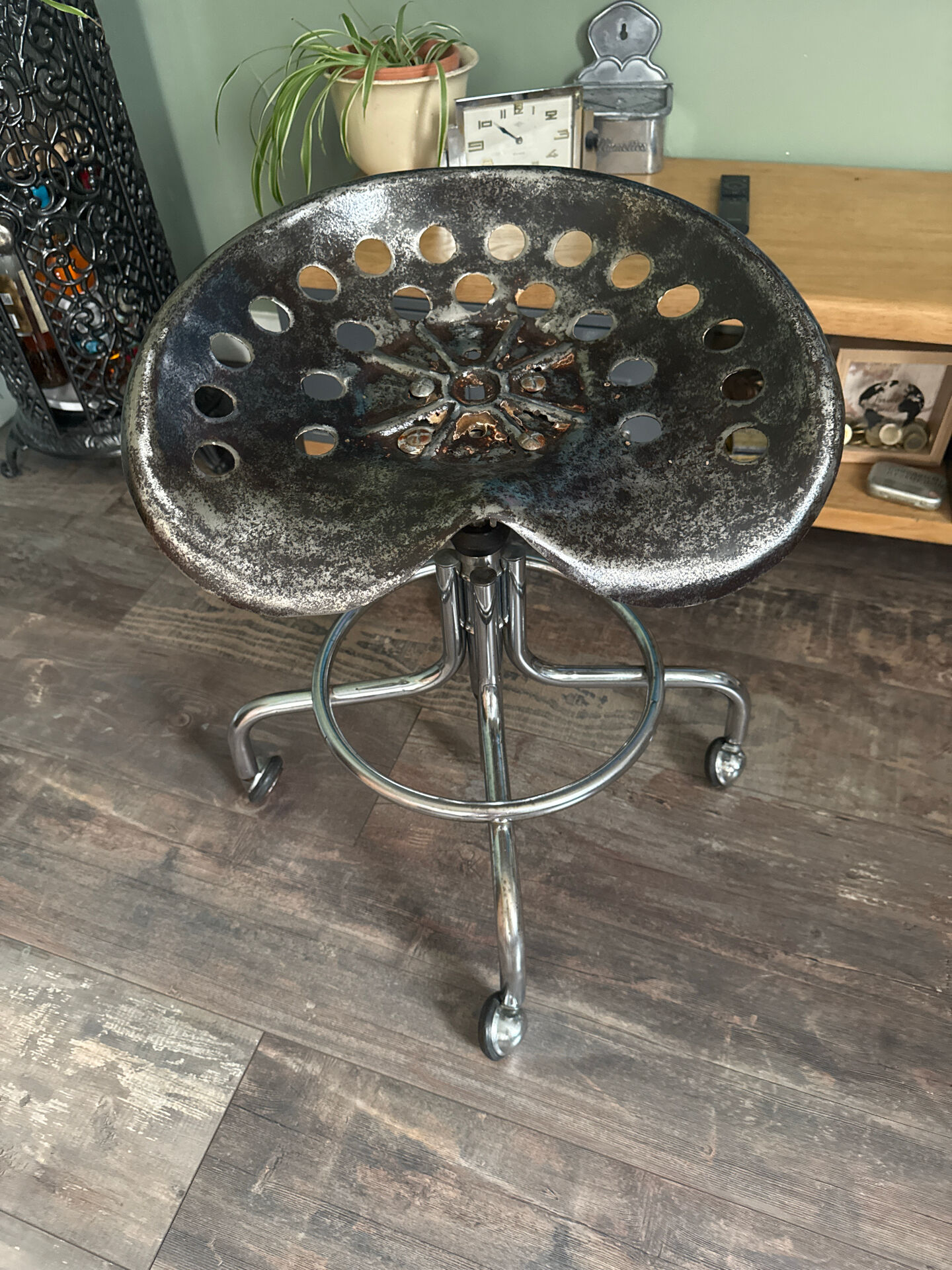 industrial chair with a perforated metal seat