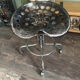 industrial chair with a perforated metal seat