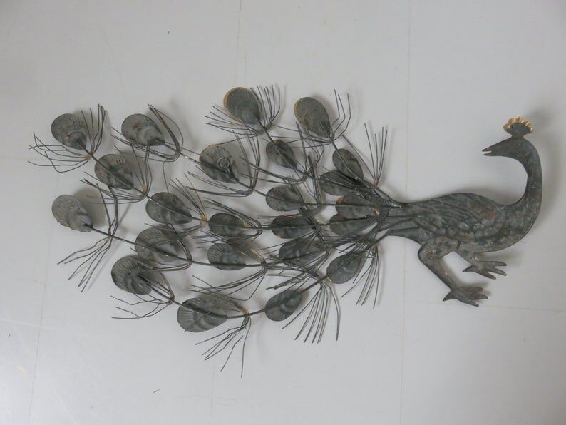 Pair of metal peacocks stamped 60s