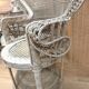 Antique armchair in rattan and wicker