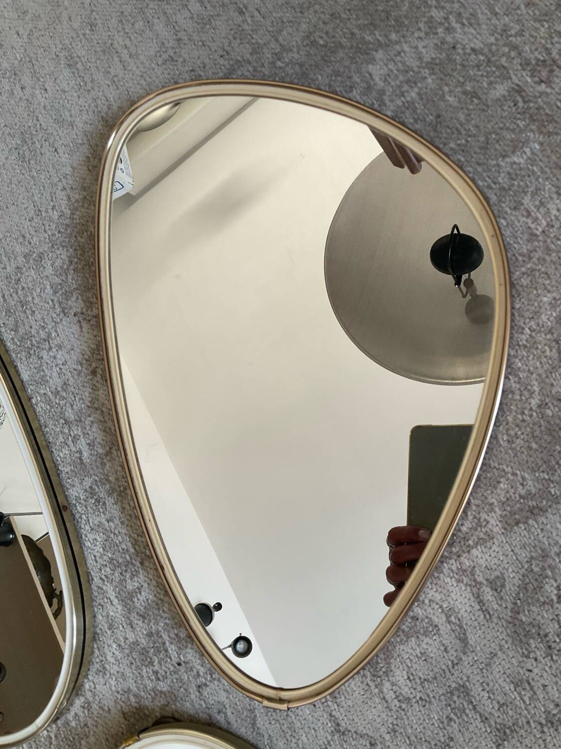 Trio of asymmetrical free-form mirrors from the 60s and 70s