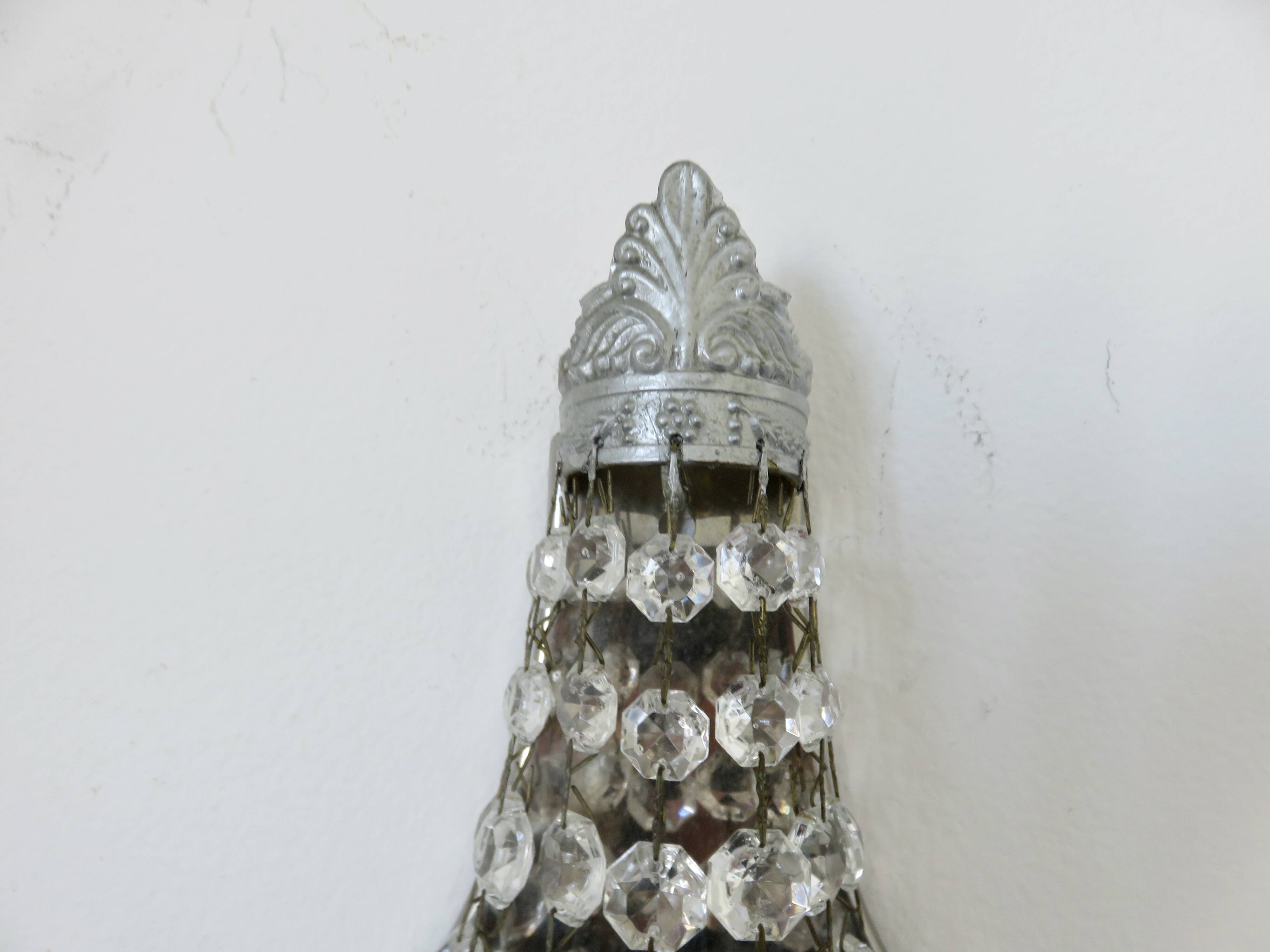 Pair of silver-plated balloon wall lights with pendants, circa 1970.