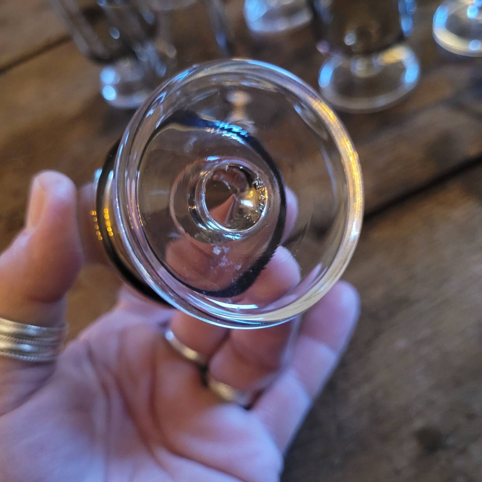 12 smoked glass stemmed glasses from the 70s and 80s.