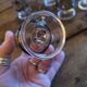 12 smoked glass stemmed glasses from the 70s and 80s.