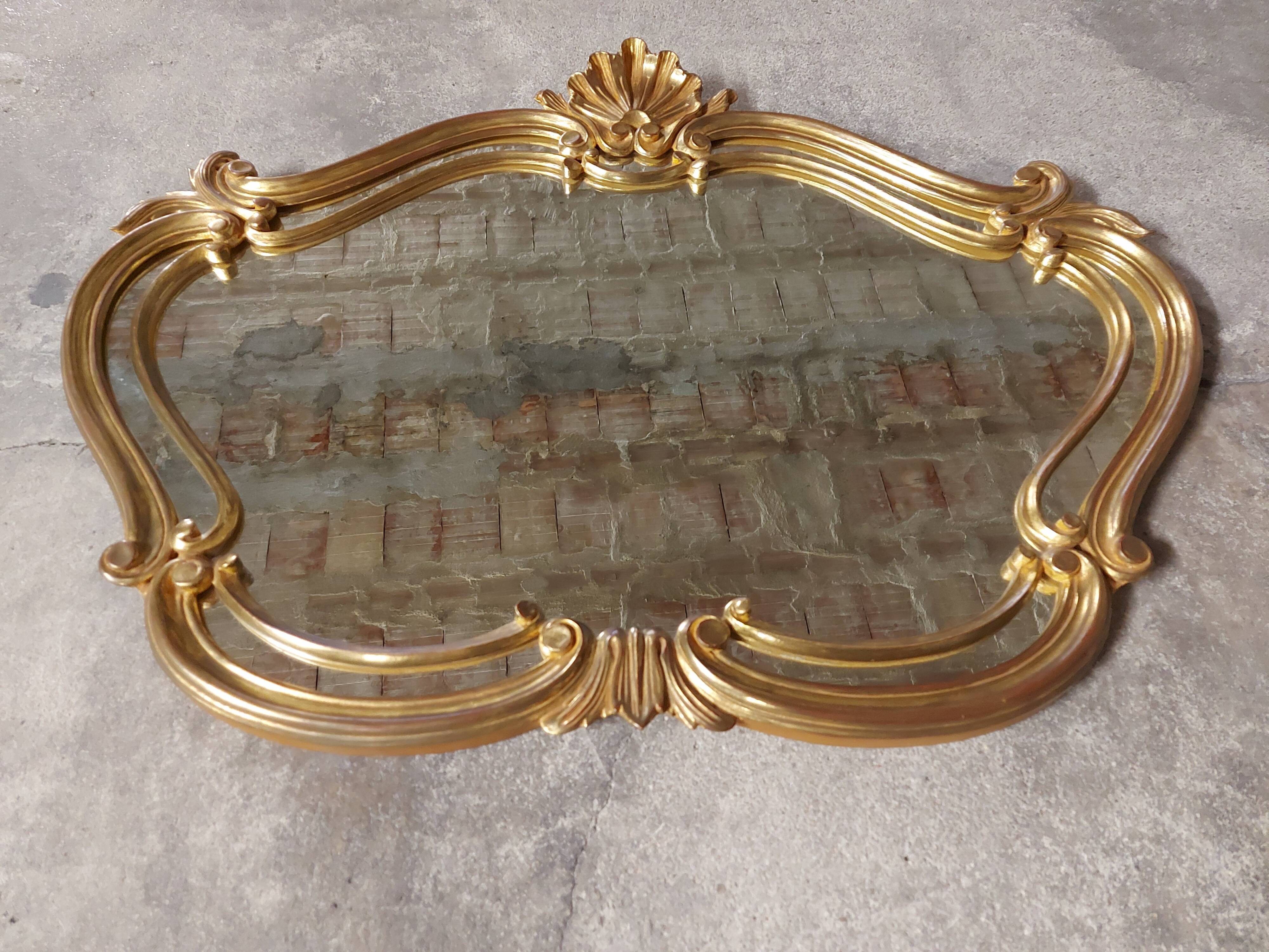 Old gilded wood mirror