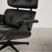 Lounge Chair and ottoman in black leather by Charles & Ray Eames, Vitra