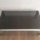 Beautiful octagonal chrome coffee table with black glass top