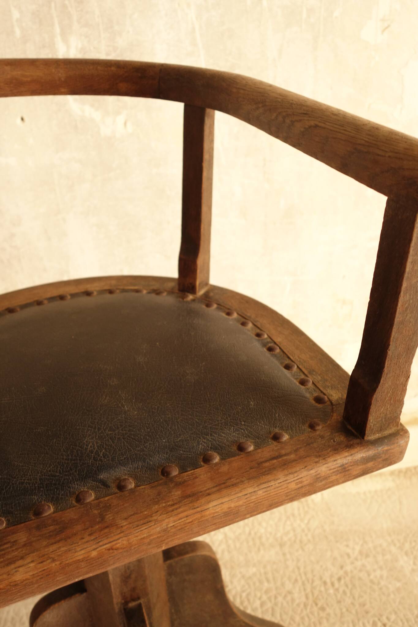 Antique wooden swivel chair