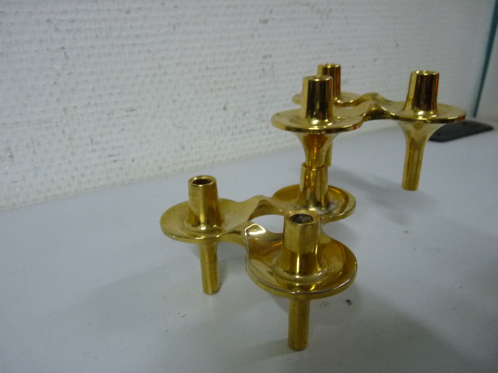 Set of 2 golden Nagel candleholders