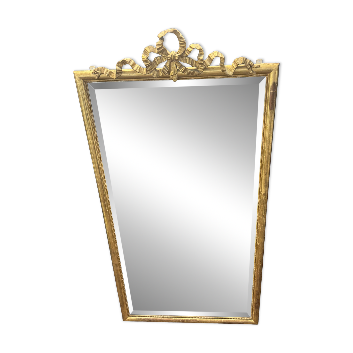 Large mirror with a gold frame