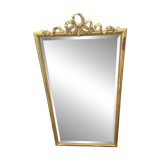 Large mirror with a gold frame