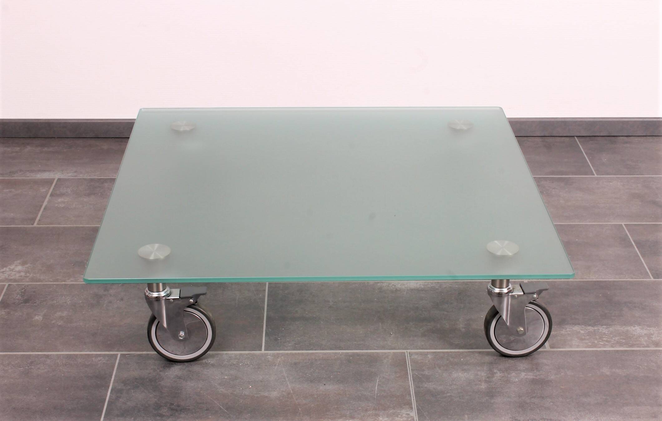 Wheeled glass coffee table