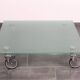 Wheeled glass coffee table