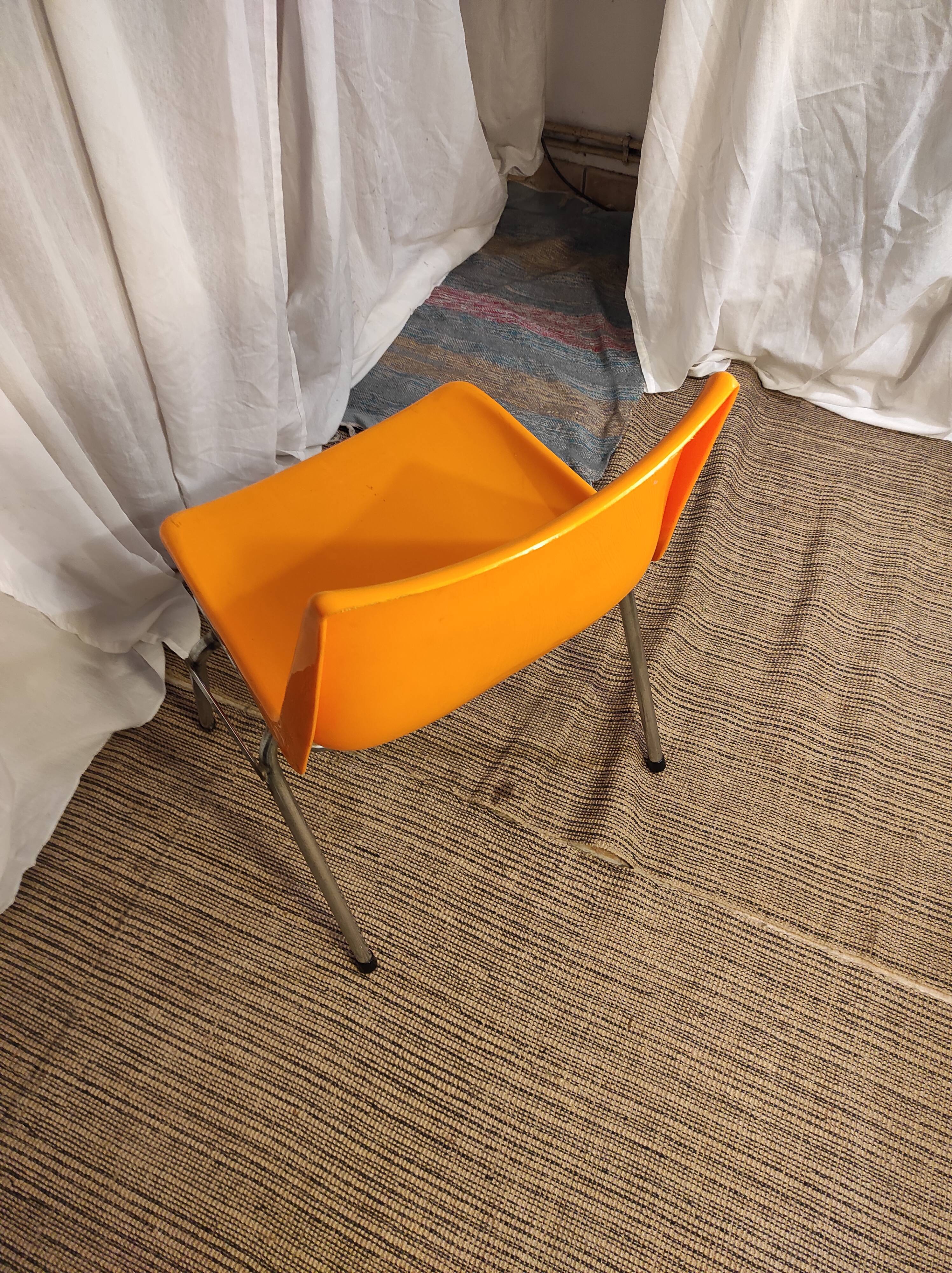 Orange plastic chair 1970