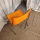 Orange plastic chair 1970
