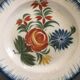 Old plate in auvillar earthenware, floral painting decoration, 19th century