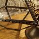 Glass and brass suspension