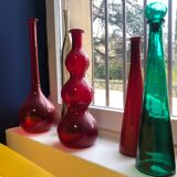 Decorative bottle in red glass