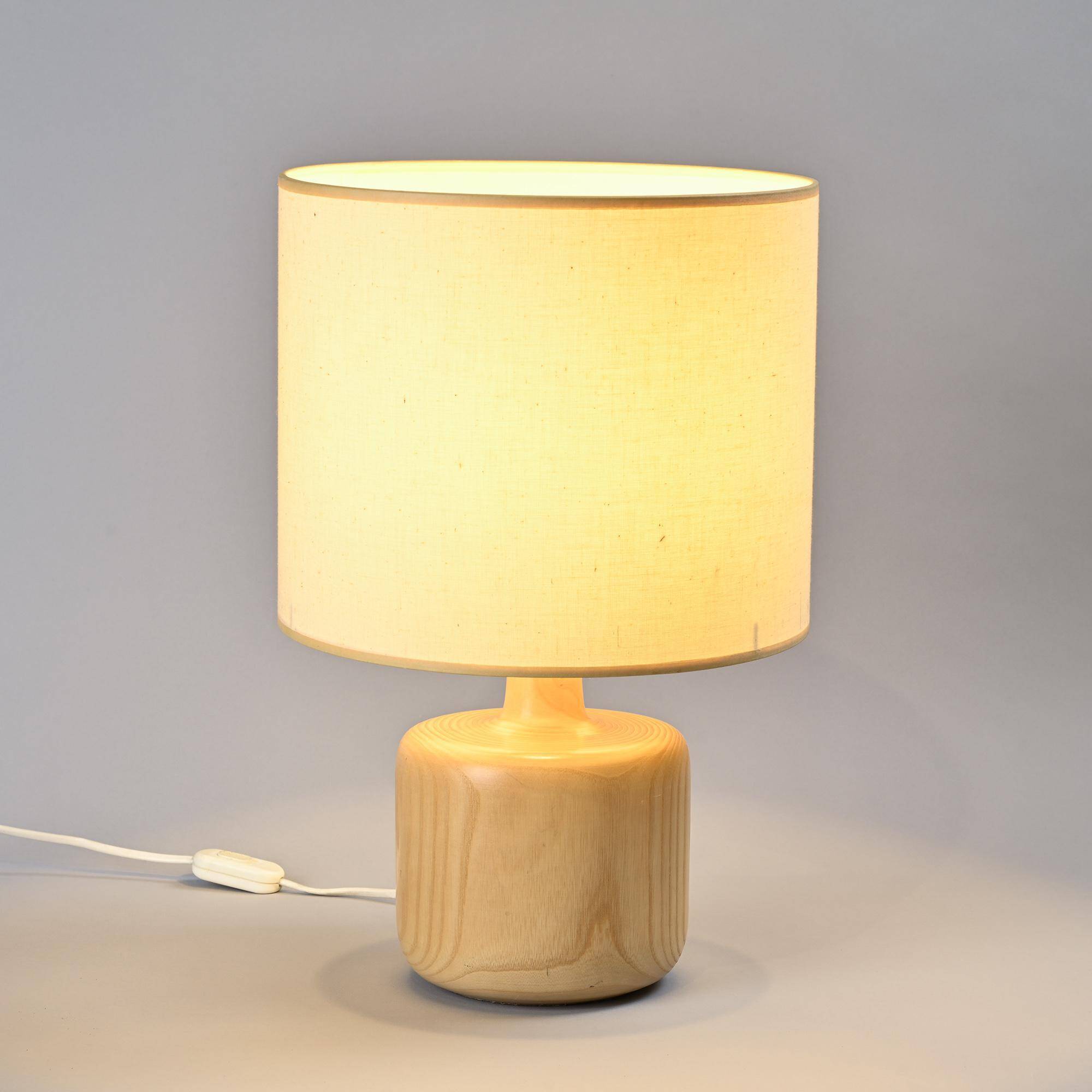 Table lamp in solid elm, France, circa 1970.
