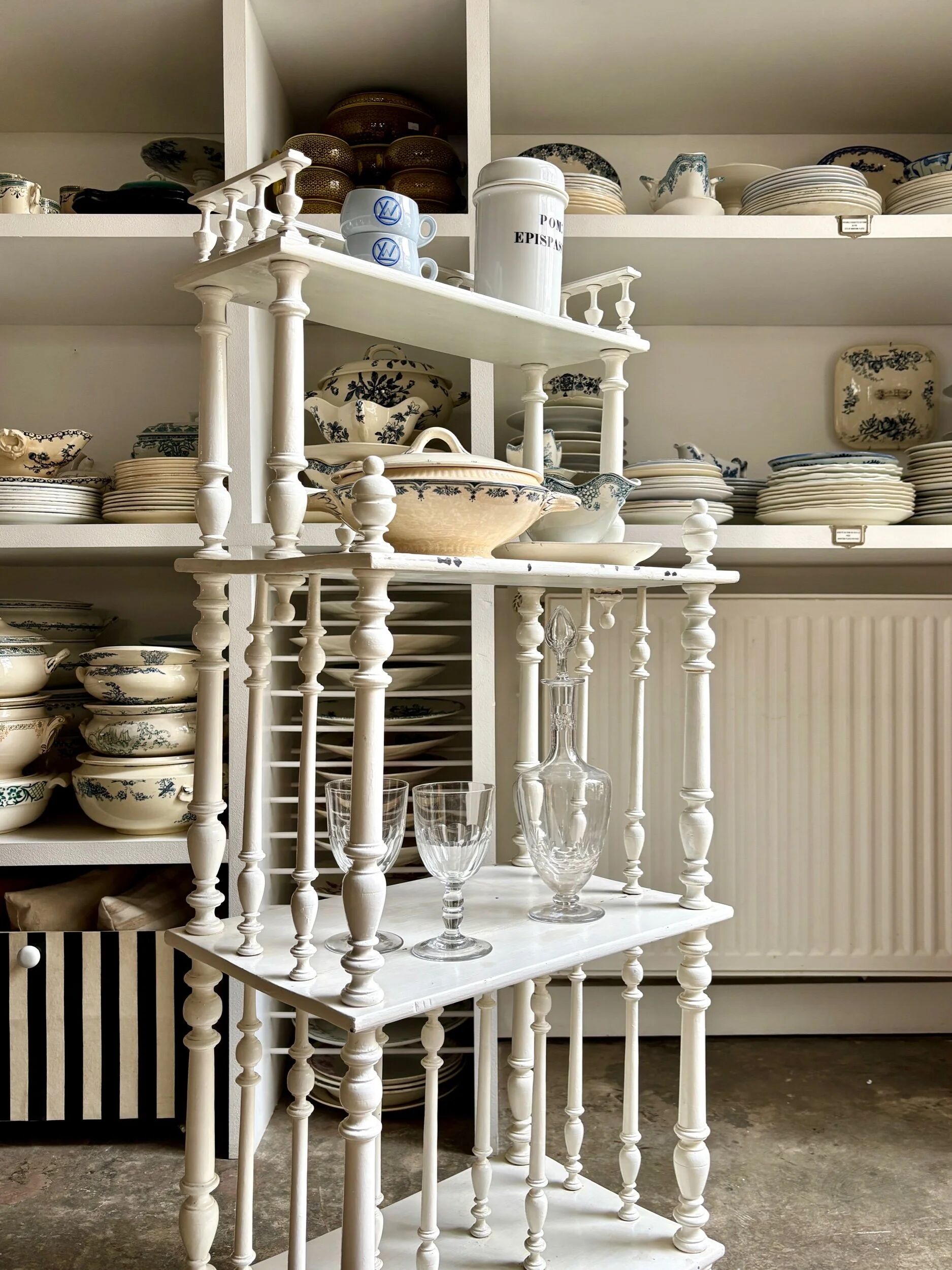 Library, white wooden sheet music cabinet.
