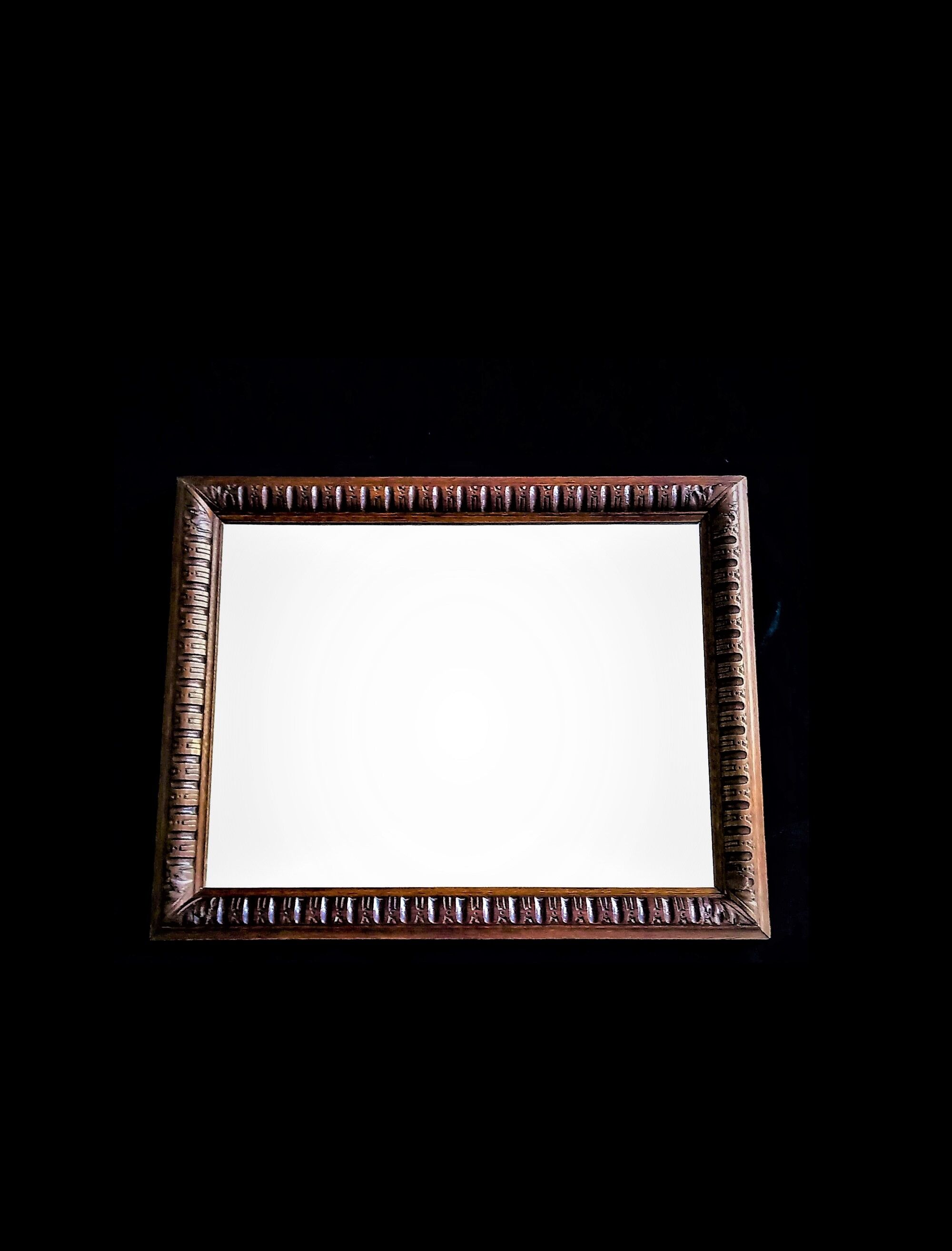 Rectangular mirror of neo-renaissance style in carved oak