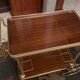 Servant table in gilded metal and mahogany mid-twentieth century