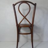 Old curved wooden bistro chair