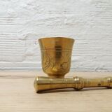 Golden brass mortar and pestle
