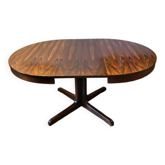 Round rosewood table with butterfly extension and star base