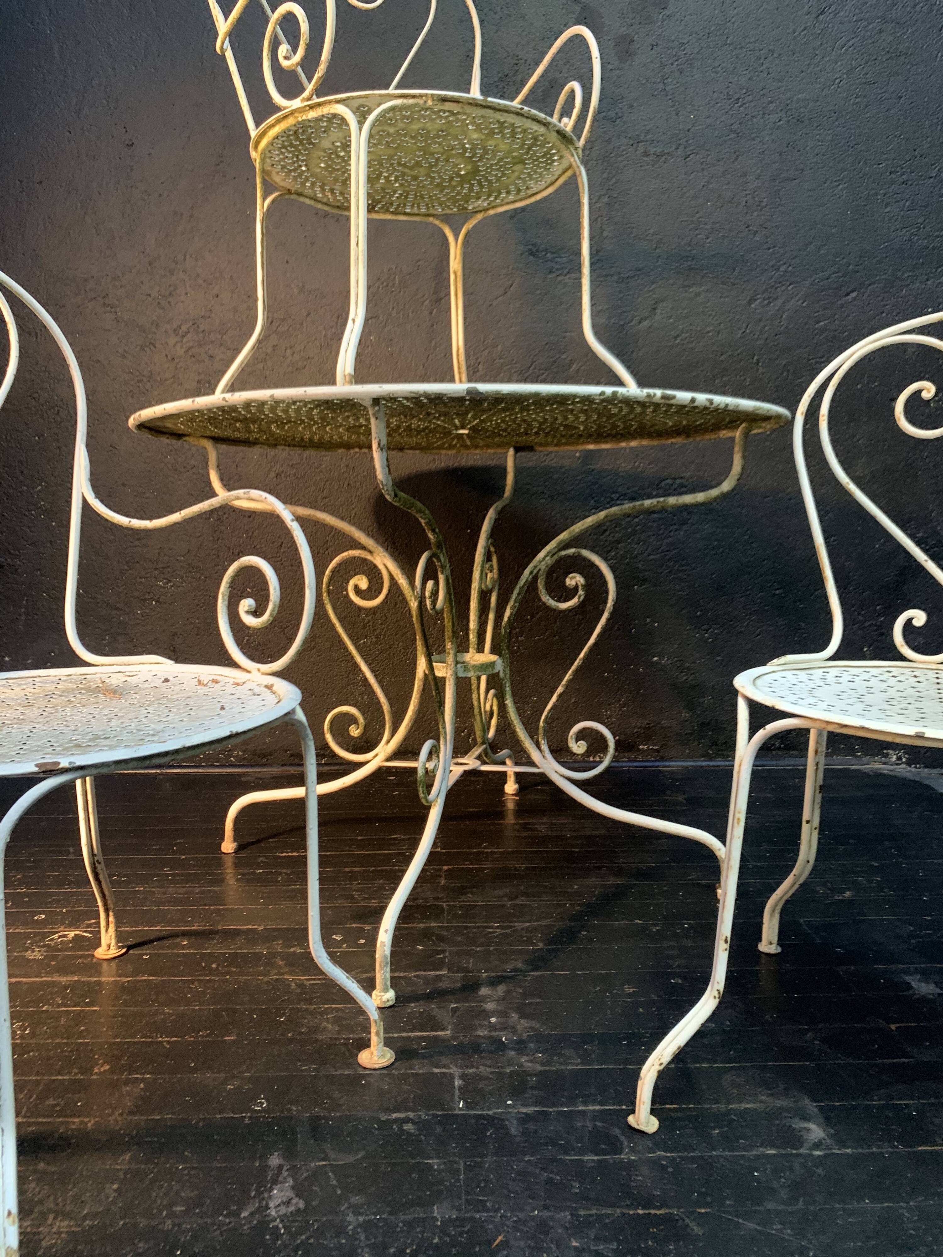 Set of wrought iron garden furniture