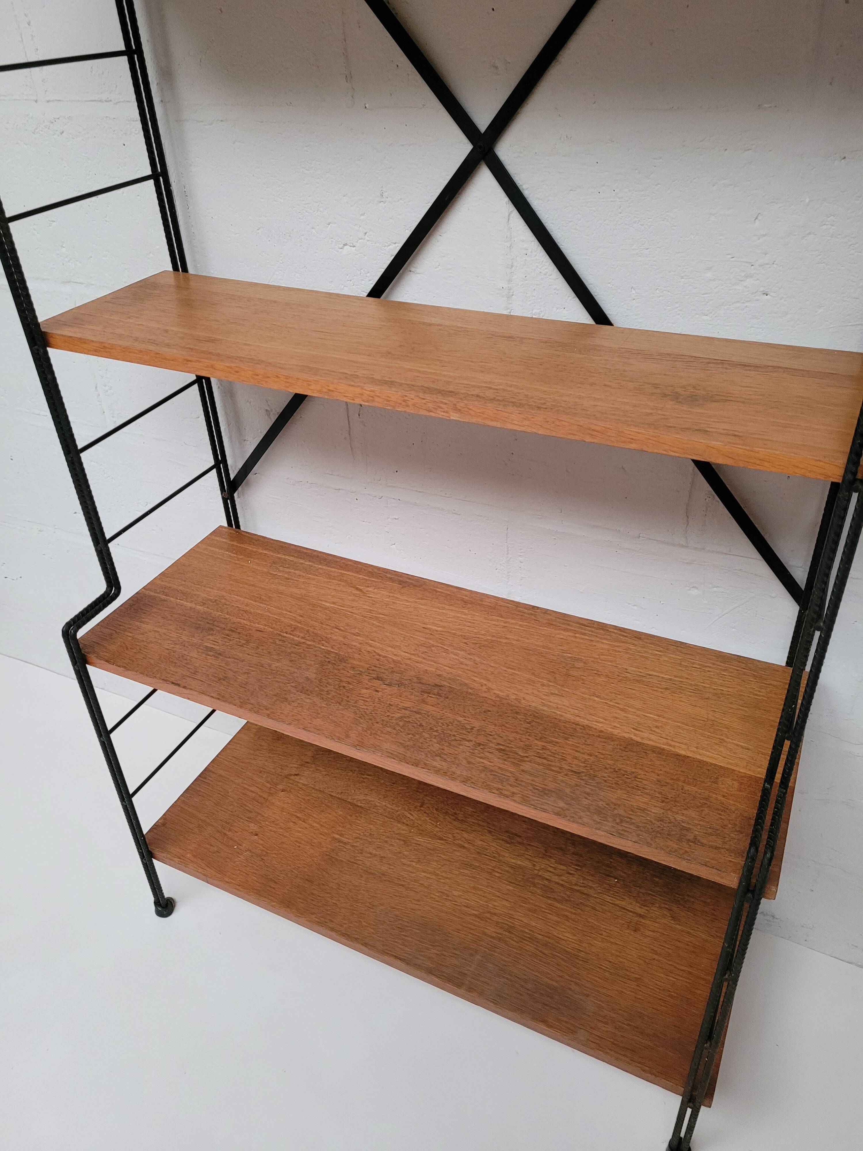 String bookcase on legs from the 50s